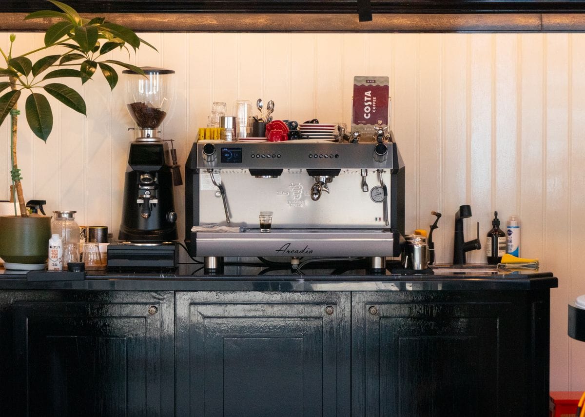 Espresso machine and grinder on a cafe bar