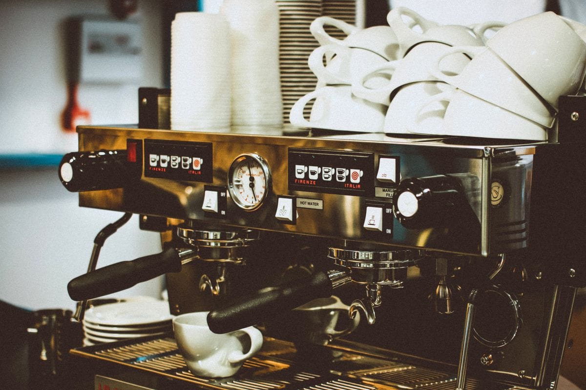 Commercial espresso machine on a bar