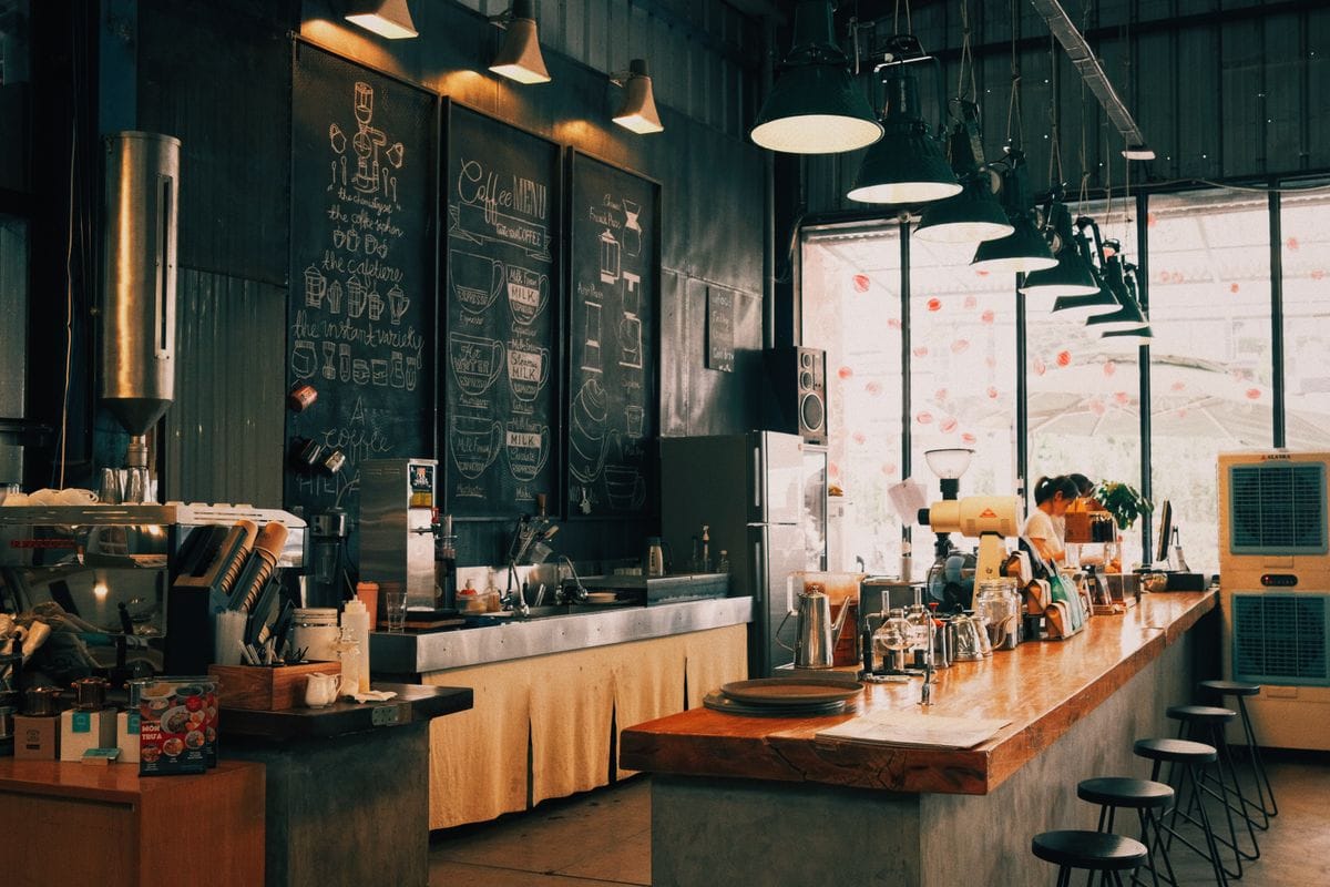 Warm cafe interior with espresso bar
